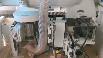 Sierra ingletadora CNC de doble cabezal